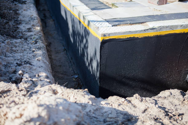 Professional Interior Drainage System technician working in Rosedale, IN